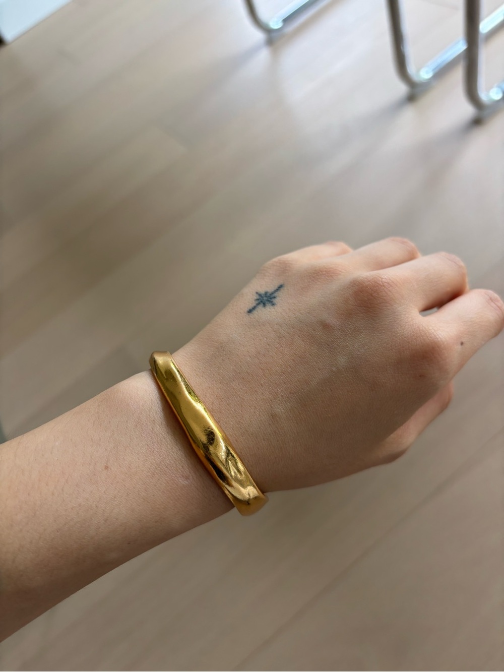 Organic gold bangle